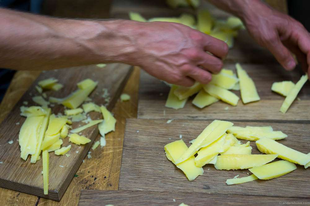 Preparing the cheese serving. Simple and rustic. My favorite: comté!