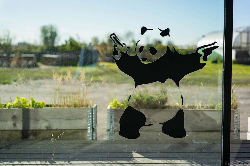 Panda with guns. Is it a Banksy or not?