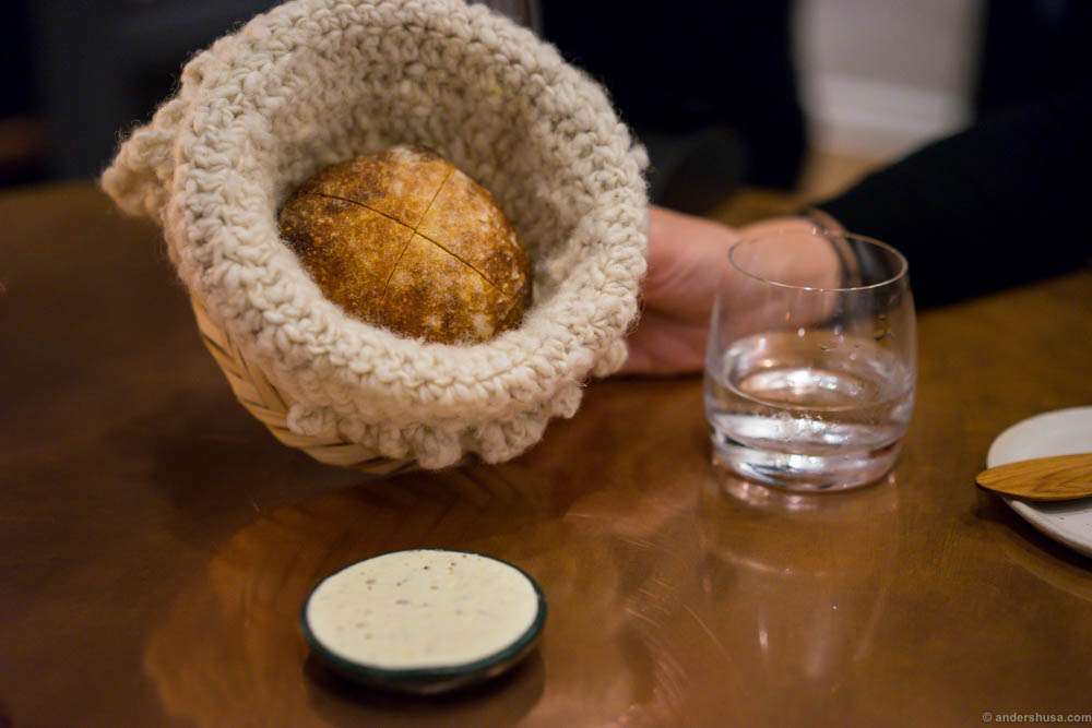 The bread serving, in a wool basket!