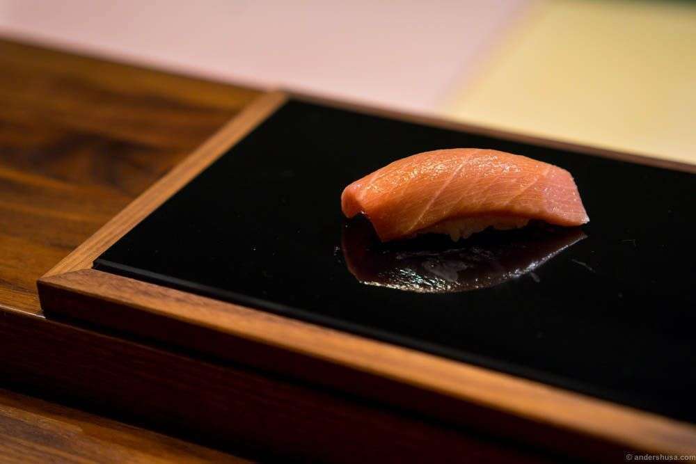 Tuna "toro" with soy sauce. Toro is the fatty part of the tuna, and considered the most valued ingredient in sushi.