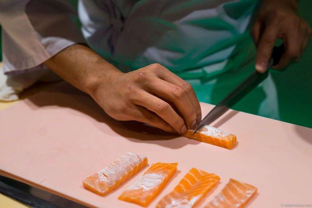 Roger sliced fine cuts into the salmon, to make it softer to bite