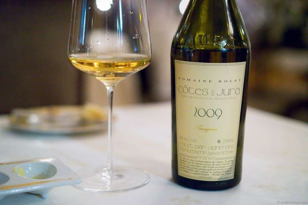 Rolet Côtes du Jura Savagnin 2009. You can tell the food will change character a bit, when a Jura hits the table. That oxidized flavor, almost like a calvados, is best with a dish that matces.