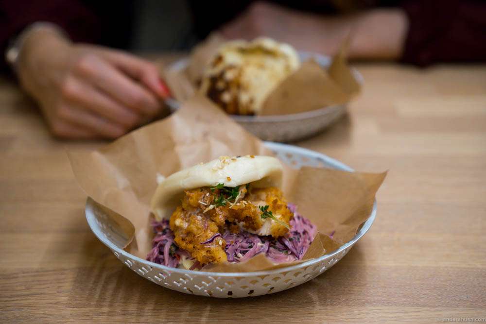 Bao with crispy, fried chicken, chili, coleslaw and wasabi cream. The chicken is so crunchy, and together with a creamy salad and a soft bun it's a mouth watering experience.