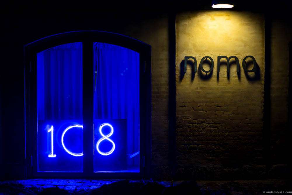 A blue-lit neon indicated that 108 is having a pop-up at Noma.