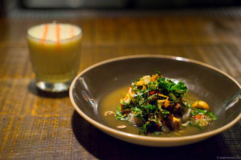 Pisco Sour with passionfruit / maracujá & Ceviche "Golden Buddha". King fish, leche de thai, bok choi, cashew, holy basil, and red curry mayo.