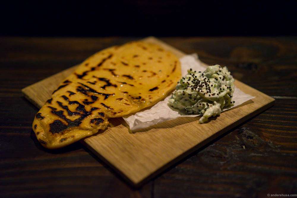 Naan with raita. This is more perfect naan bread than you get at most Indian restaurants, and with proper amounts of butter!
