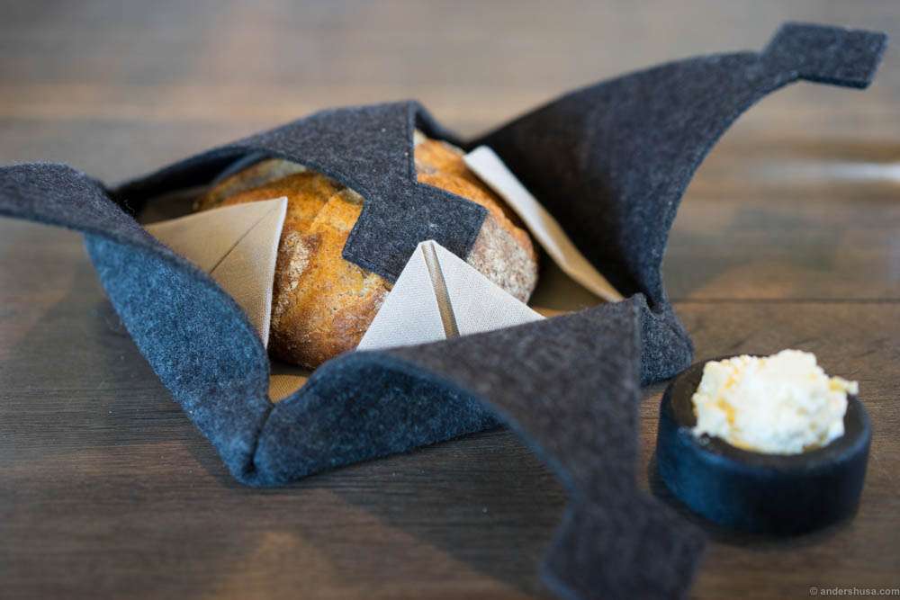 The sourdough with virgin butter. Served warm in a woolen basket. Refilled whenever you empty it. The butter is amazing, with a slight acidity to it. Freshly delivered from the famous Butterviking