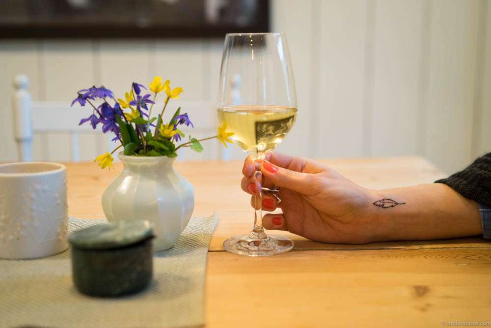 Enjoying a glass of wine in our apartment before dinner