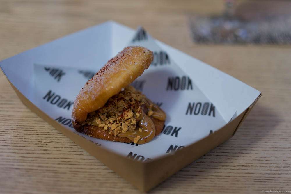 Deep-fried steam bun with chocolate cream, dulce de leche, toasted salty peanuts and chili