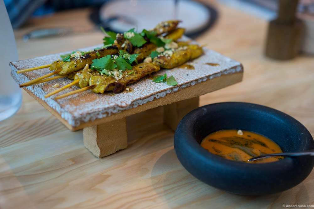Chicken Satay. The spicy peanut sauce came in the heaviest bowl you'll see in a restaurant: Rocky by Odd Standard