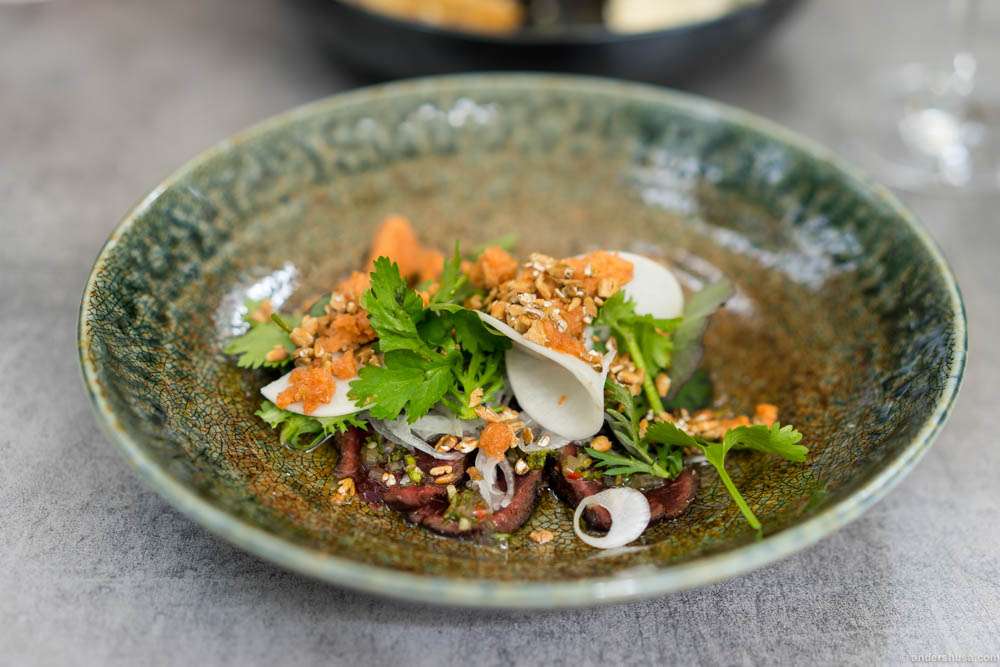 A teaser of a new dish. Whale tataki, tomato granita, and pickled turnips