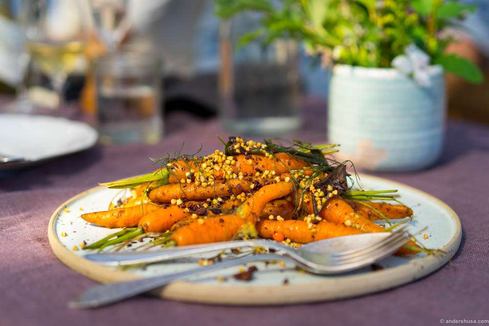 Baked carrots with cocoa nibs, fennel and seabuckthorn