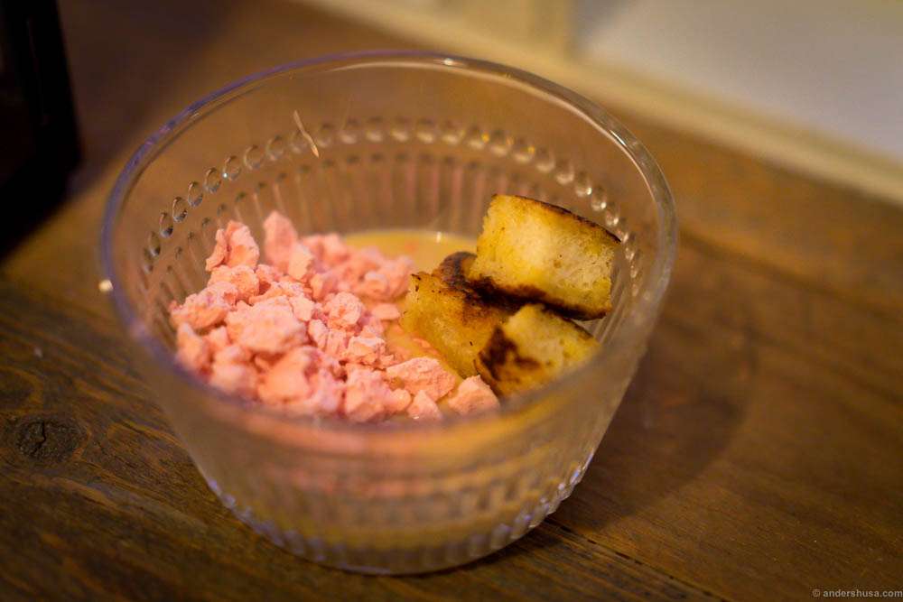 A brown cheese panna cotta, nitro-frozen "trollkrem" of lingonberries and pieces of French toast.