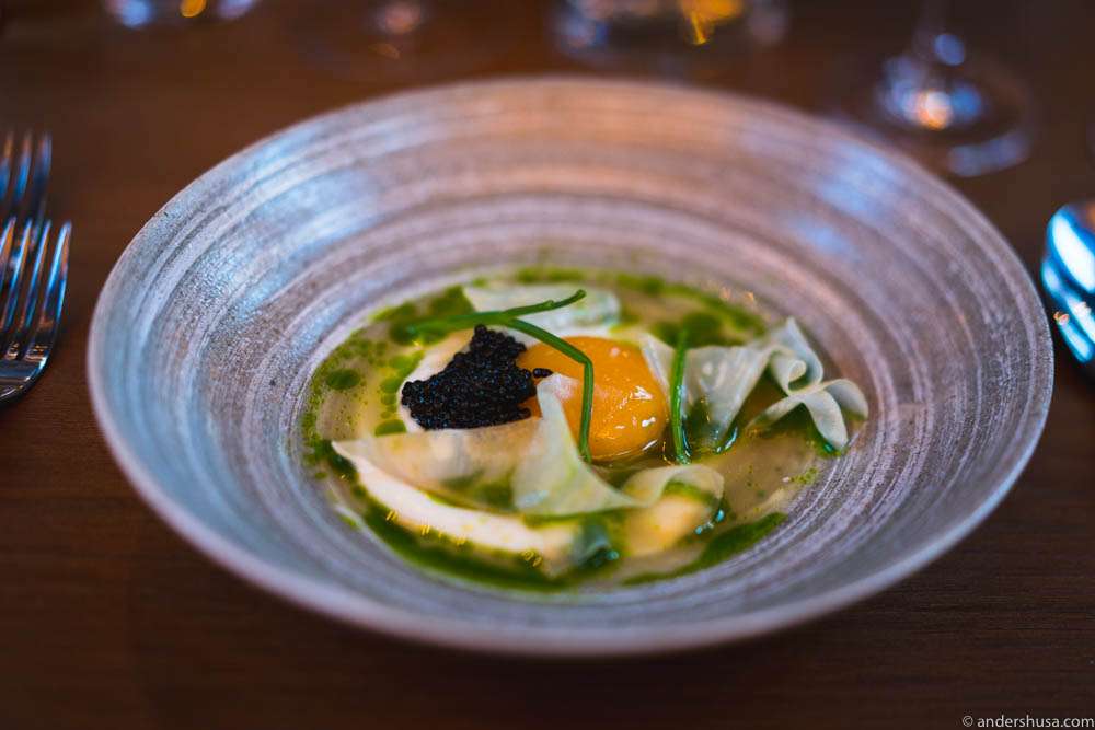 Celeriac cream, confit egg yolk from Holte Gård, Finnish sturgeon caviar, and a juice of celeriac, apple and parsley