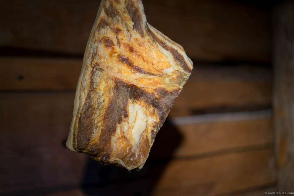 Dry aged meat hanging from the ceiling in the dining room