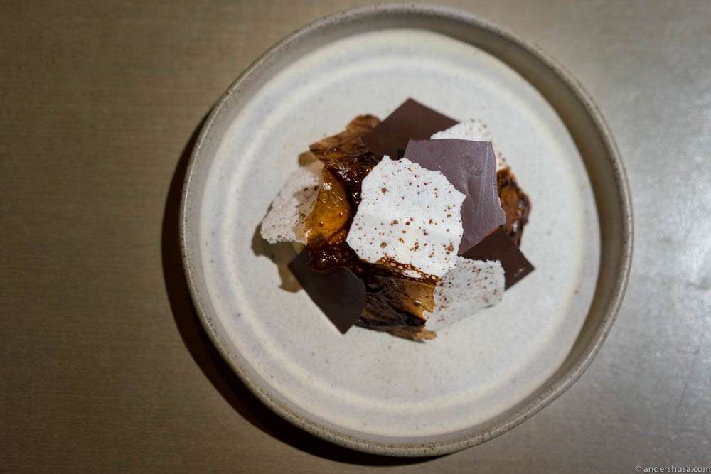Cocoa crisps, smoked vanilla ice cream, roasted white chocolate & orange