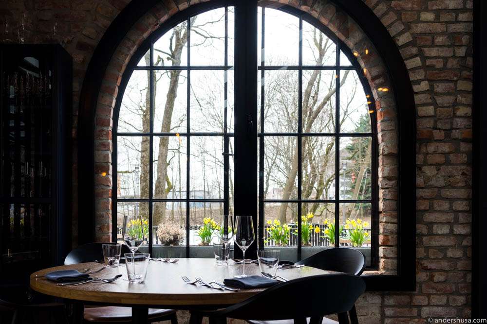 Large, industrial windows allow natural light to come in