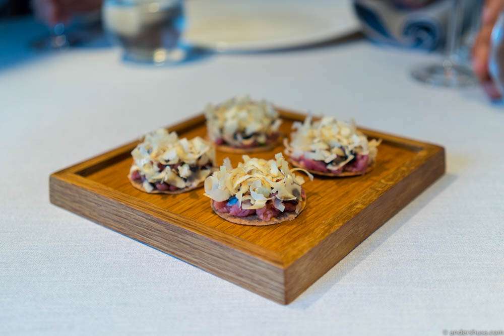 Walnut tart, black walnut cream, tartare of kid & shaved walnuts