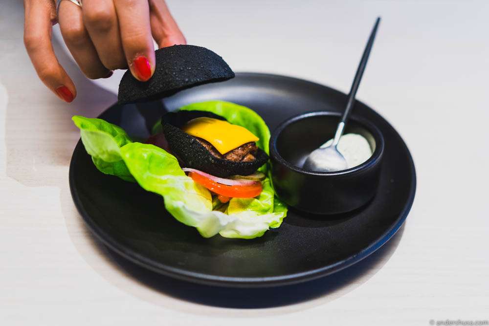 The patty revealed inside its crispy shell