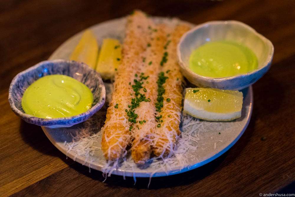 Deep fried white asparagus with parmesan cheese, chives mayo & lemon. Only at Pjoltergeist!