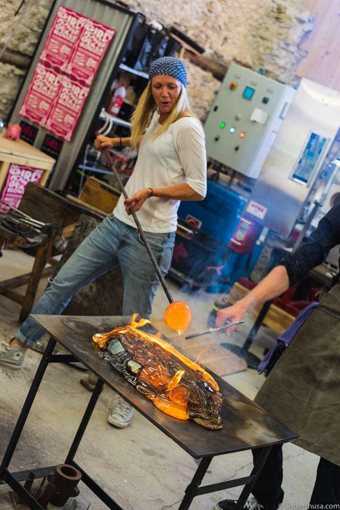 Jennie and Luqaz cooking with molten glass