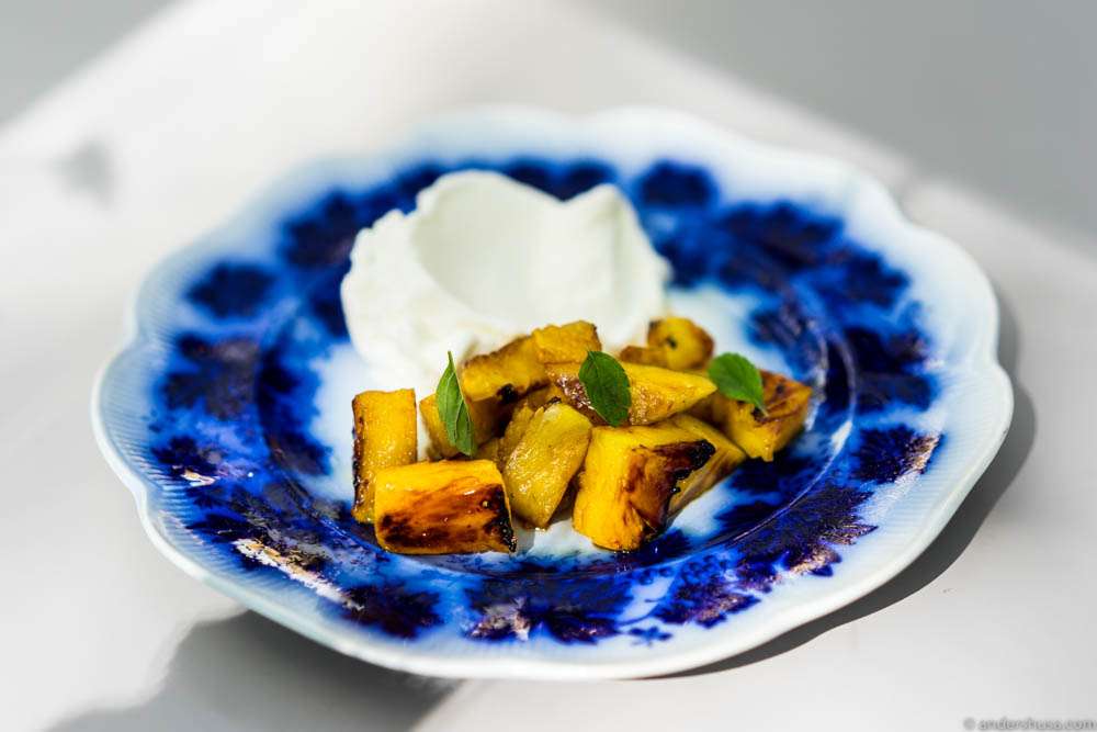 Sour cream ice cream flavored with laurel, served with grilled pineapple