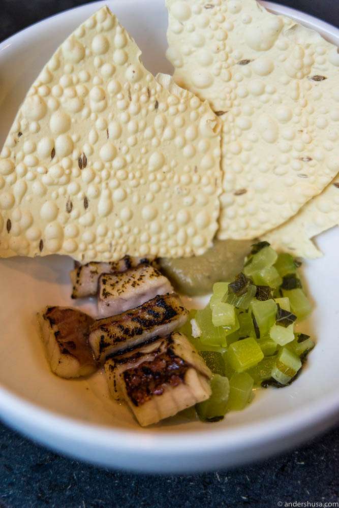 Smoked eel, cucumber & Indian papadum bread.