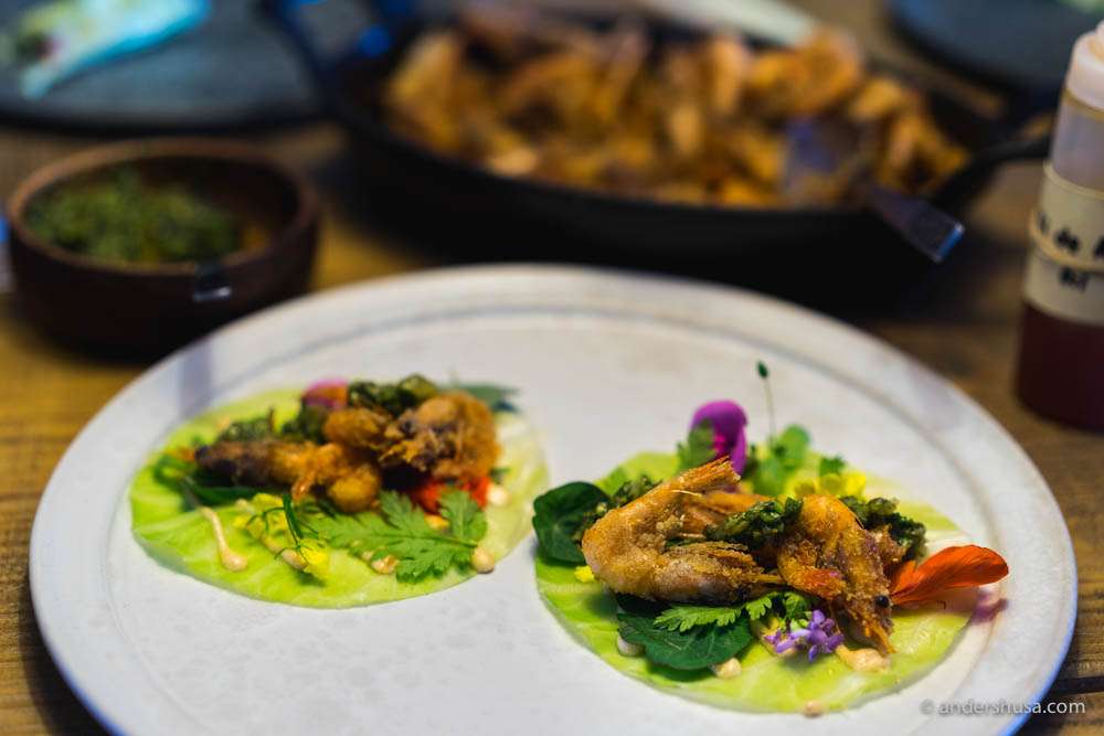 Cabbage tacos with flowers, herbs & deep-fried shrimps