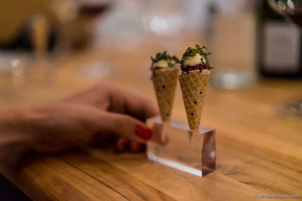 Cornets with tartar and pickled green tomatoes
