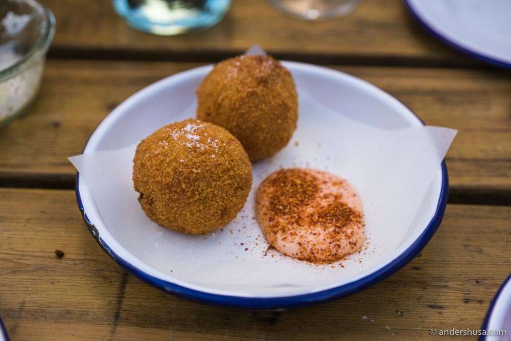 Lobster arancini with lobster coral aioli.