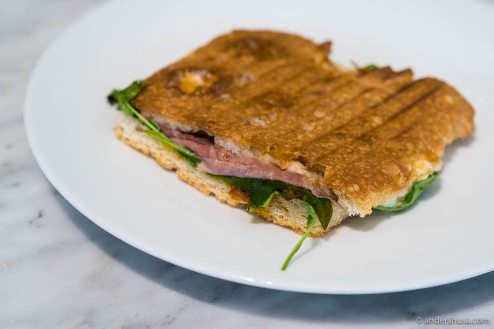Focaccia with Parma ham, cheese, and spinach. You can have it toasted or fresh