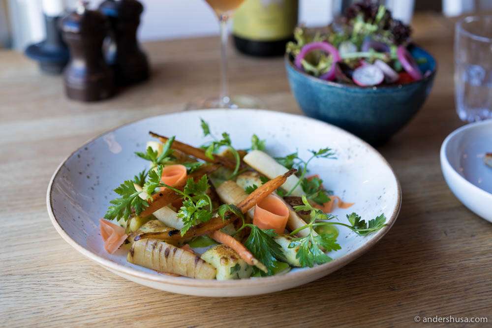 Gnocchi with braised carrots and parsley roots, buttery toast, and ramson emulsion