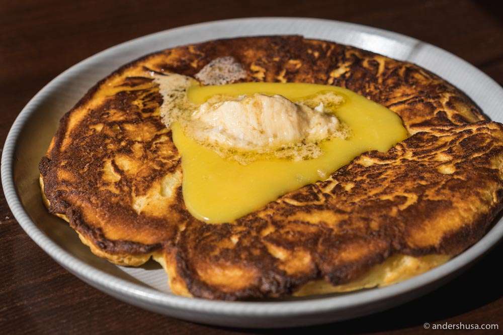 Kesong Puti Pancakes with calamansi curd and muscovado butter.