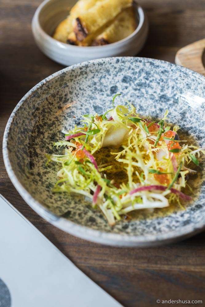 Raw halibut with yuzu, brown butter, and shiitake mushrooms.