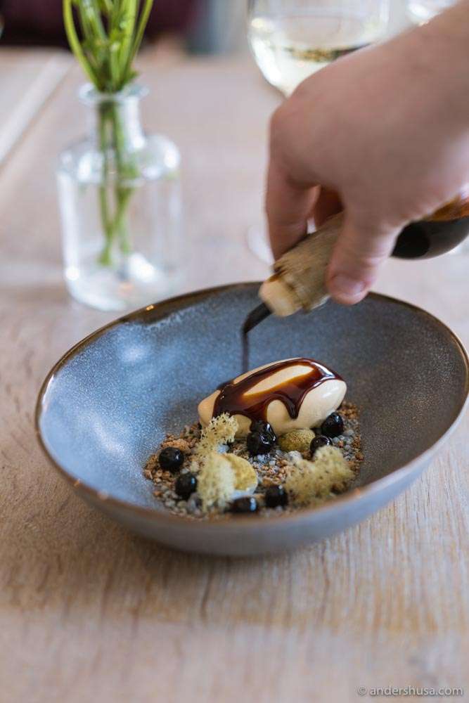 A dessert of potato ice cream, birch syrup, and pine shoots.