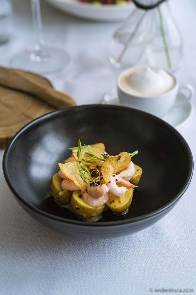 Potato salad with shrimp, mayo, and potato crisps.