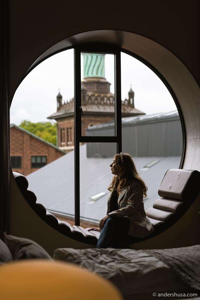 The hotel's signature round windows overlook Bryggernes Plads.
