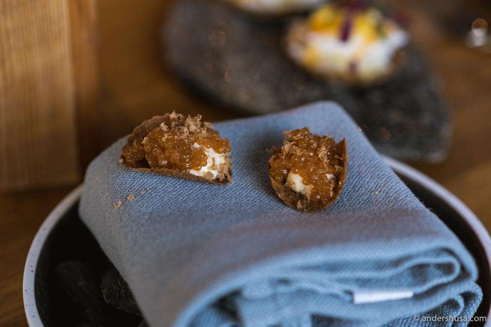 Rye crisp, bottarga roe, and bottarga mayo.