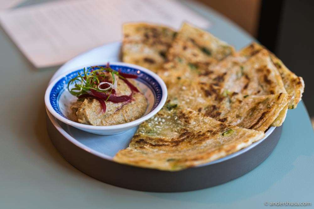 Delicious scallion pancakes with burnt onion cream.