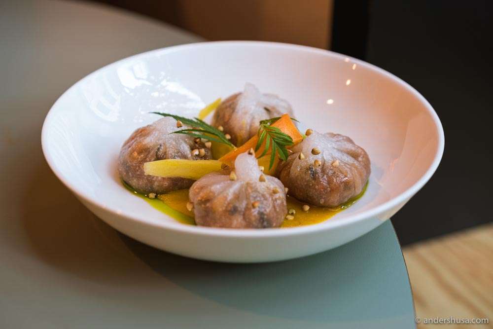 Veggie dumplings with carrot purée.