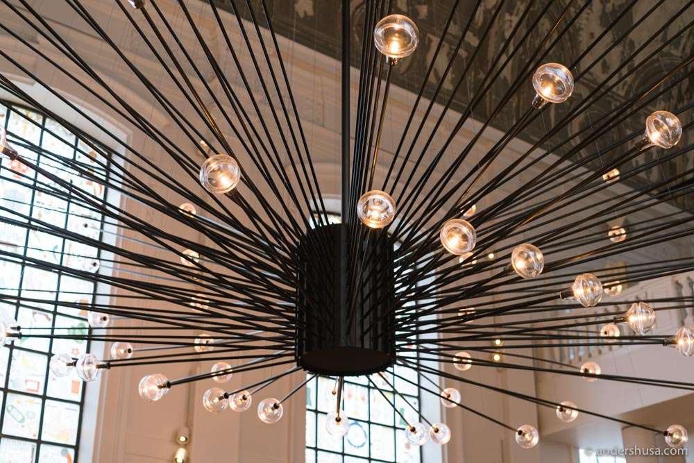 The gigantic light fixtures dominate the dining room at The Jane.