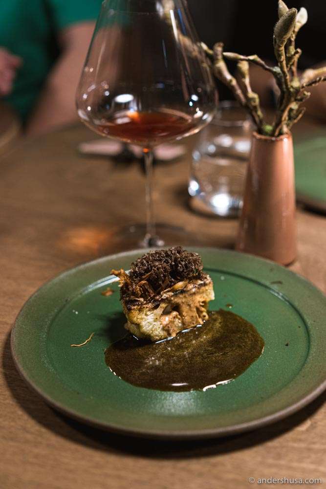 Cauliflower with almond praline and black truffles.
