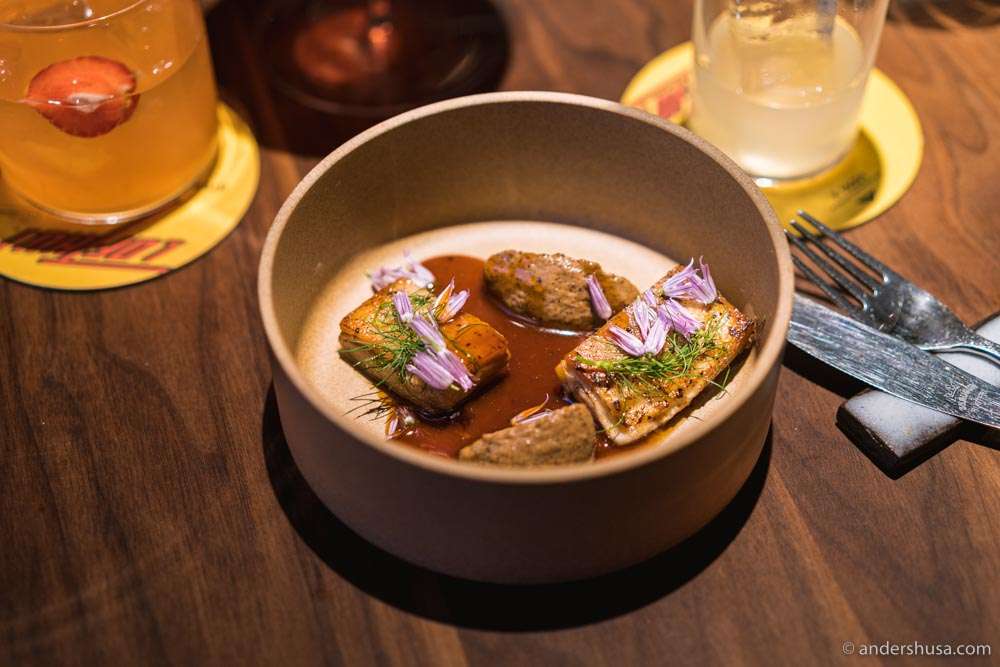 Lamb belly, burnt cabbage cream, sweet and sour lamb sauce, & dill.