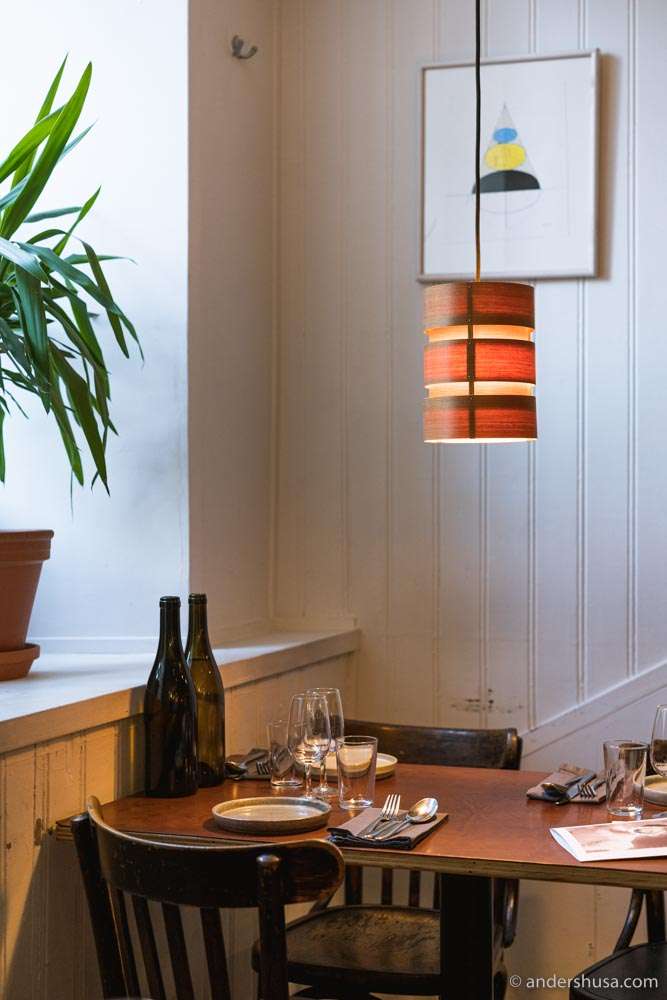 The interior is like a cozy Parisian wine bar.
