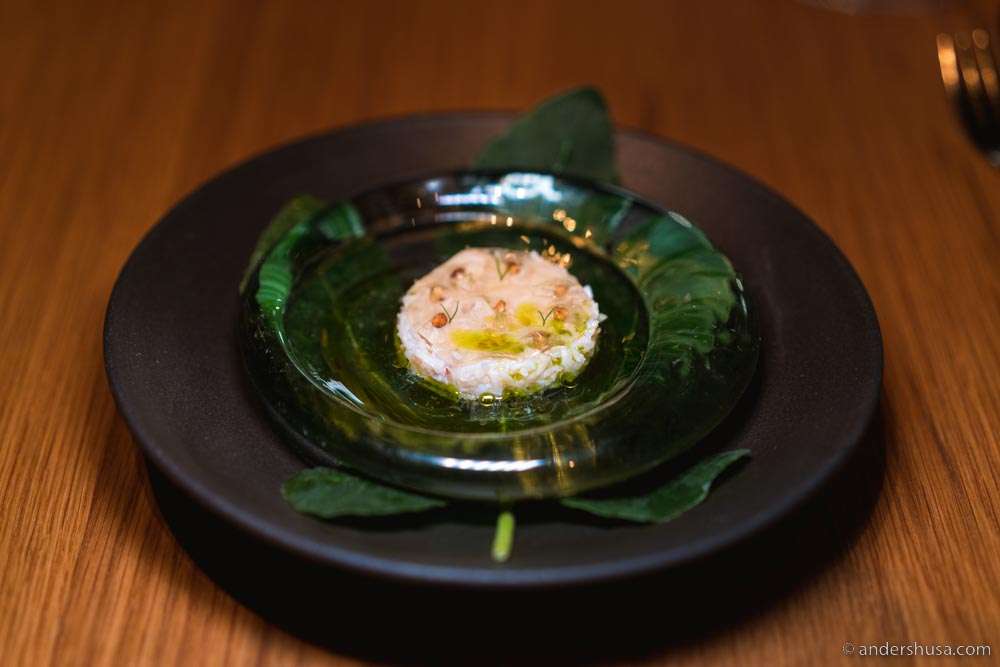 Hitra crab, egg white garum emulsion, gel of crab stock and chamomile, toasted buckwheat, elderflower, & fig oil.
