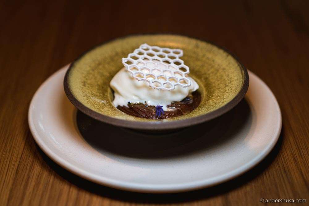 Milk ice cream, seaweed caramel, coffee grounds, licorice powder, bay leaf oil, pickled plums, honey tuile, & yogurt.