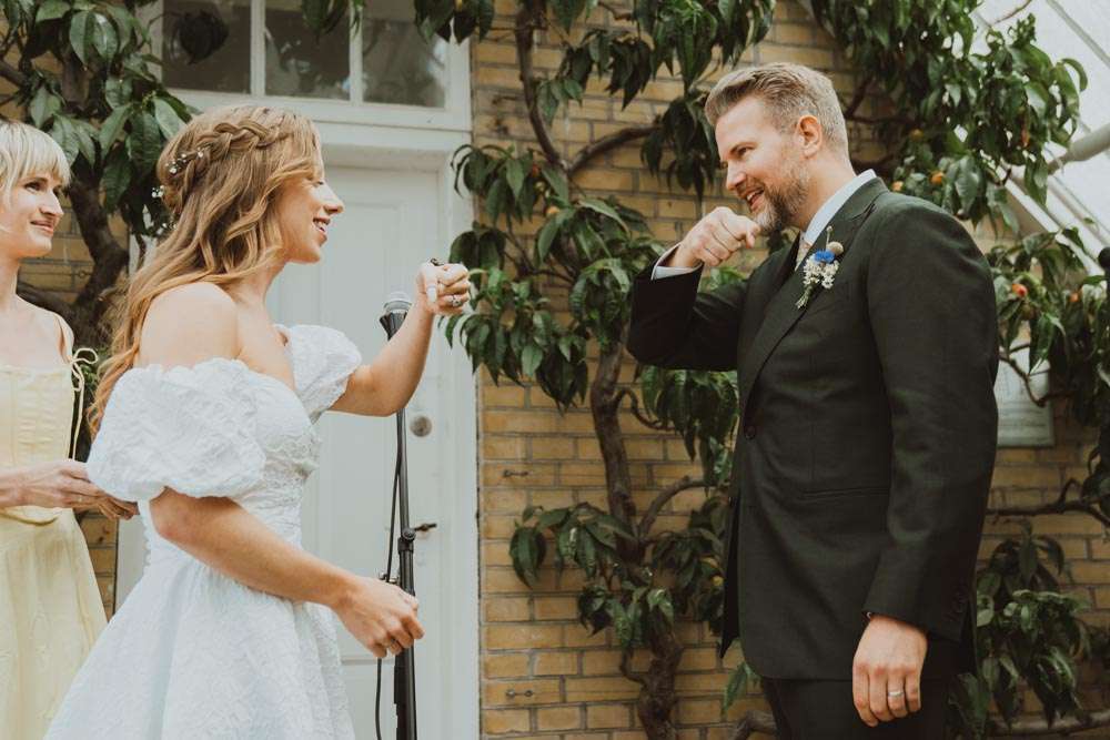 “You may now bump the bride!" Photo by Hanna Bursuk.